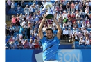 EASTBOURNE, ENGLAND - JUNE 21:  Feliciano Lopez of Spain celebrates with the trophy after beating Richard Gasquet of France during their Men's Singles Finals match on day eight of the Aegon International at Devonshire Park on June 21, 2014 in Eastbourne, England. (Photo by Jan Kruger/Getty Images)